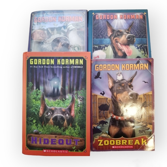 4x Gordon Korman books hard cover Hideout Zoobreak Jackpot Show Off dogs novels - Picture 1 of 1